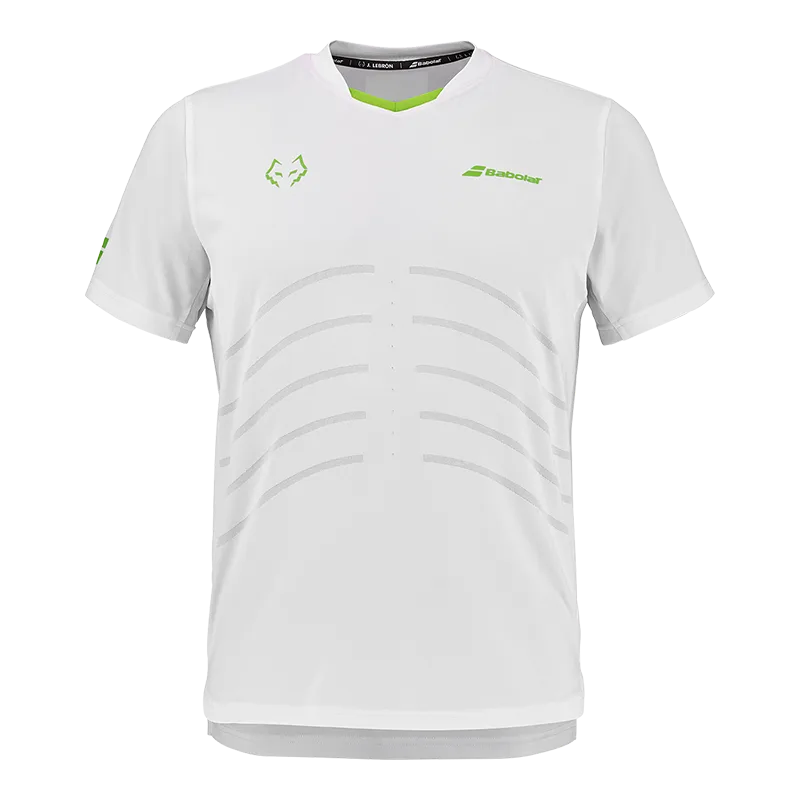 Camiseta oficial Babolat de Juan Lebrón, color blanco con logo naranja